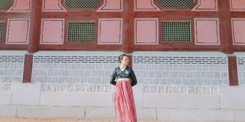 traditional Korean village with hanbok-clad people